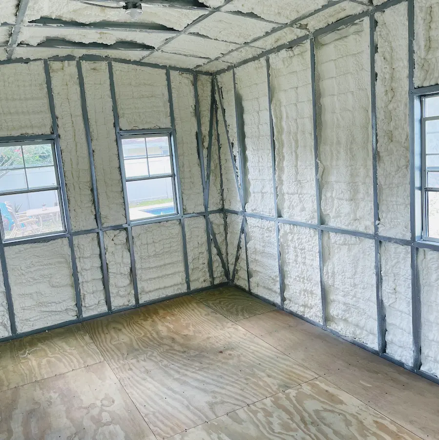 Closed-cell spray foam insulation applied to wall cavities in a residential project in East Chicago